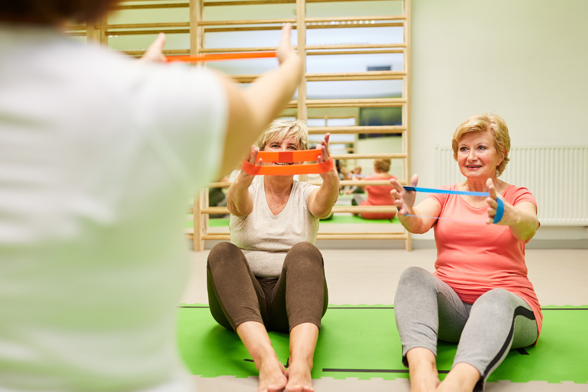 Seniors Exercise with the Theraband in Rehab